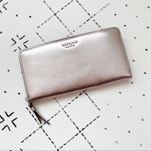 Kate spade rose gold zip around full size wallet